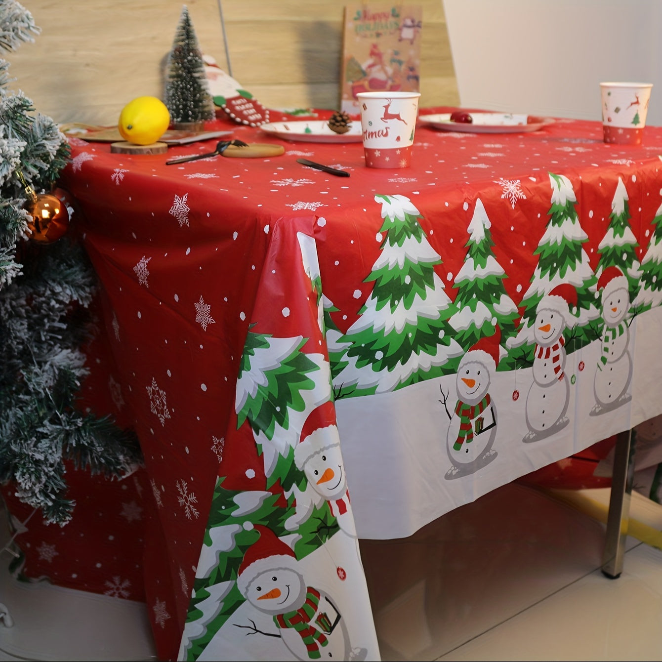Christmas Snowman and Tree Disposable Tablecloth - Waterproof, Oil-Proof, Vibrant Color, Plastic Table Cover for Holiday Party, 1 Piece, 53.94x107.87inch